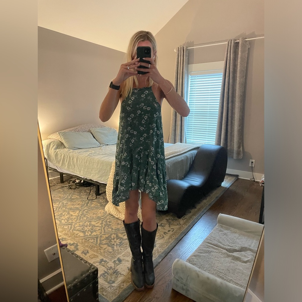 Boutique Green Floral Dress. Flowy and size small. Exposed back.